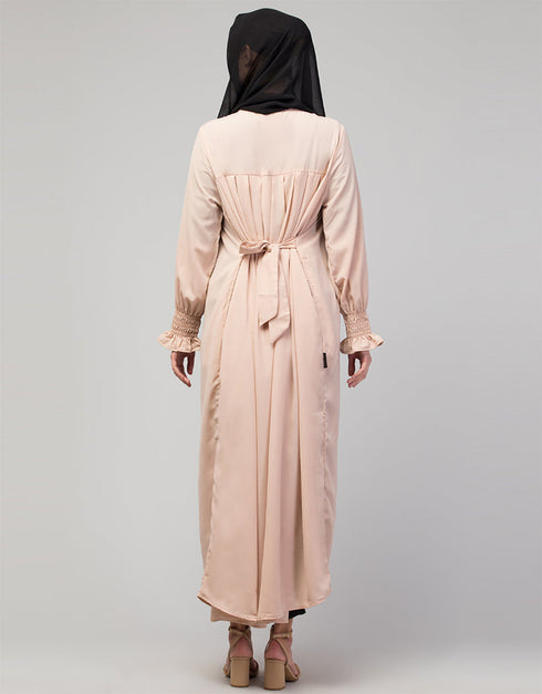 Chic Abaya with pleated chest and bell sleeves for a casual look In Color Blush Skin