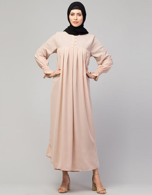 Chic Abaya with pleated chest and bell sleeves for a casual look In Color Blush Skin