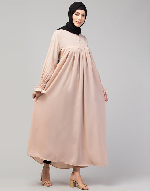 Chic Abaya with pleated chest and bell sleeves for a casual look In Color Blush Skin