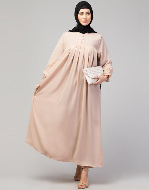 Chic Abaya with pleated chest and bell sleeves for a casual look In Color Blush Skin