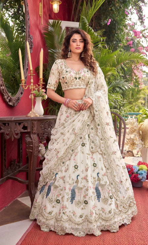 Off White Faux Georgette Lehenga Choli Ethnic Sequins Embroidery Cut Work Lehenga With Cancan & Canvas Patta - Front View | Samyak Fashion