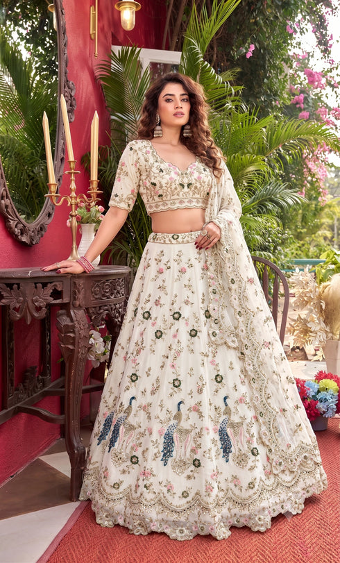 Off White Faux Georgette Lehenga Choli Ethnic Sequins Embroidery Cut Work Lehenga With Cancan & Canvas Patta - Side View | Samyak Fashion