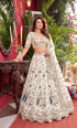 Off White Faux Georgette Lehenga Choli Ethnic Sequins Embroidery Cut Work Lehenga With Cancan & Canvas Patta - Side View | Samyak Fashion