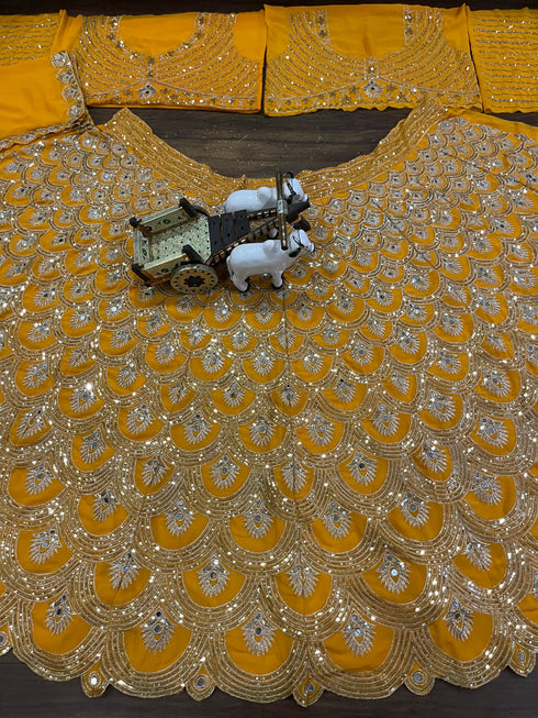 Yellow Faux Georgette Lehenga Choli Ethnic Real Mirror Sequins Embroidery Work With Cancan & Canvas Patta - Side View | Samyak Fashion